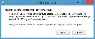 yapışkan tuşlar uyarı